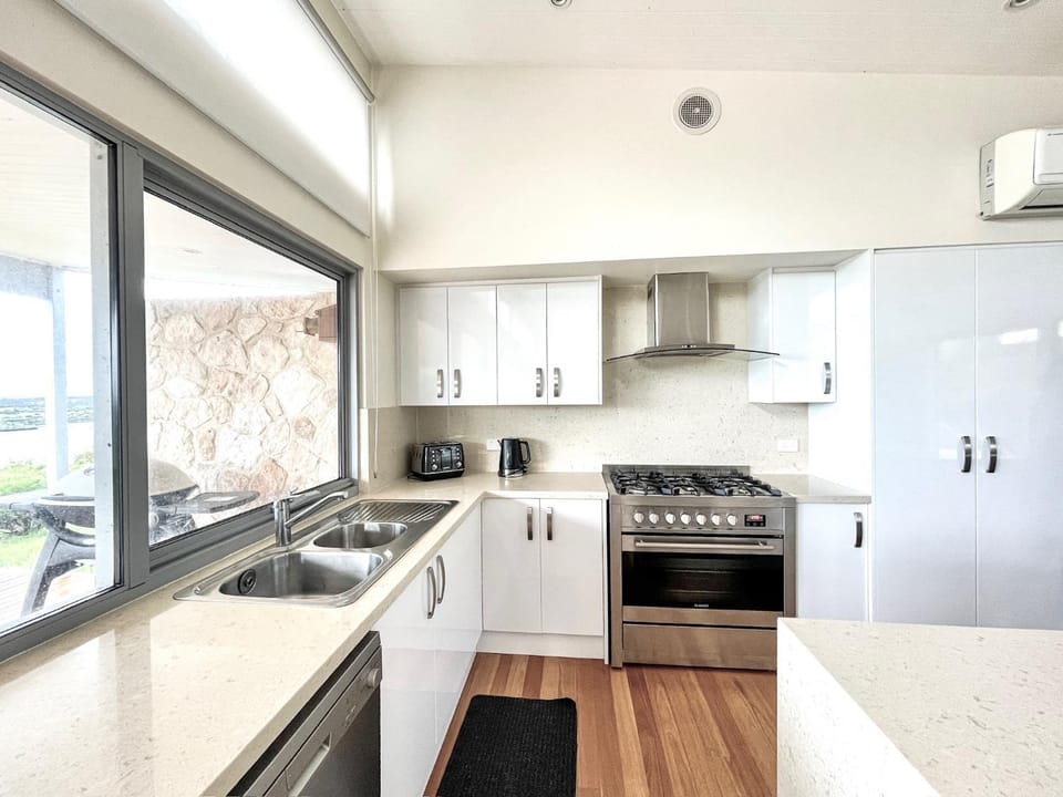 Sea view, dishwasher, oven, stove, kitchen