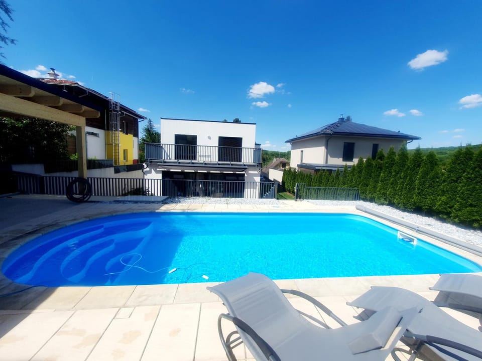 Property building, Living room, Swimming pool