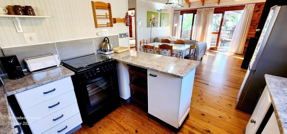 Kitchen or kitchenette, oven, stove, toaster
