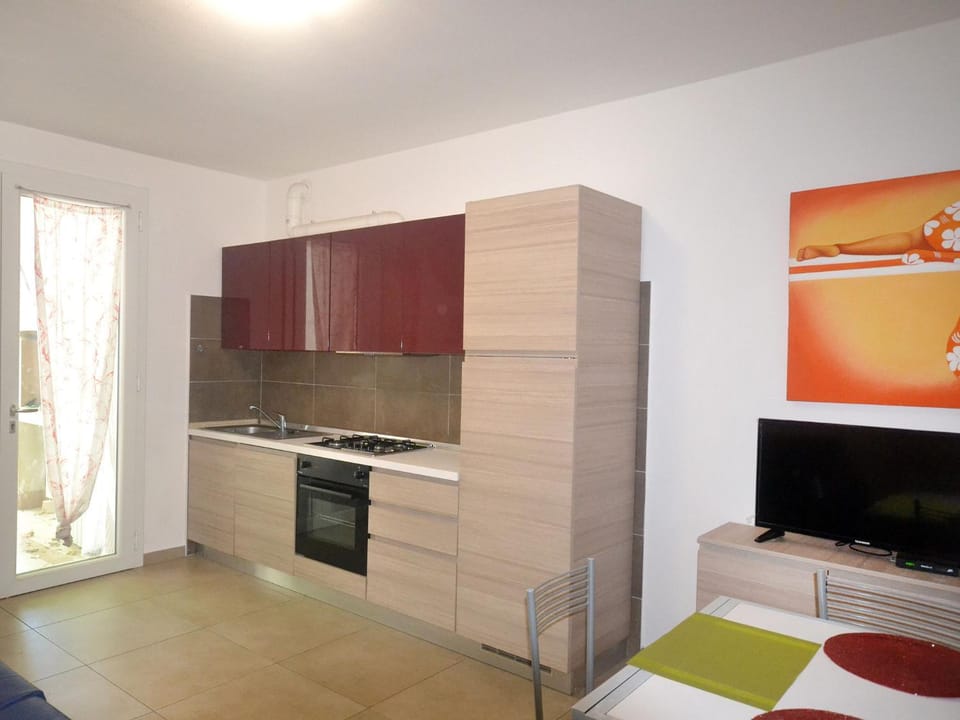Kitchen or kitchenette, oven, stove