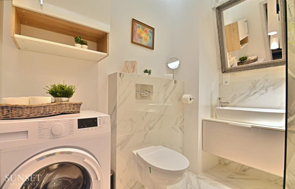 Shower, Toilet, Bathroom, towels, washing machine, dryer