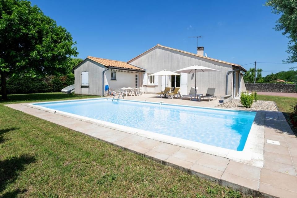 Property building, Patio, Day, Garden, View (from property/room), Pool view, Swimming pool, sunbed
