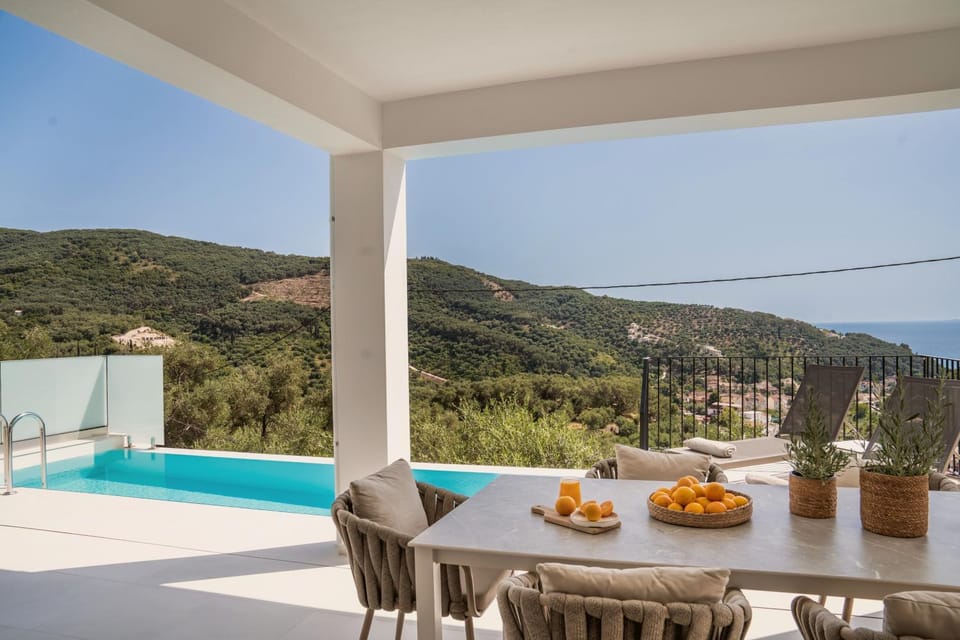 View (from property/room), Balcony/Terrace, Mountain view, Pool view, Sea view, Swimming pool