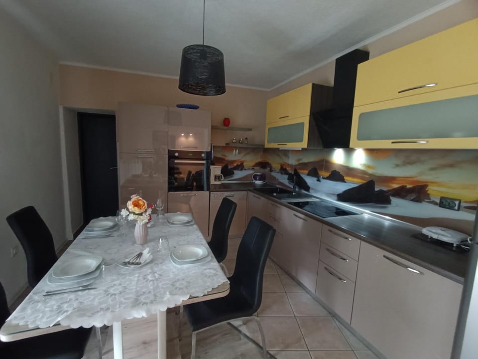 Dining area, dishwasher, stove, kitchen