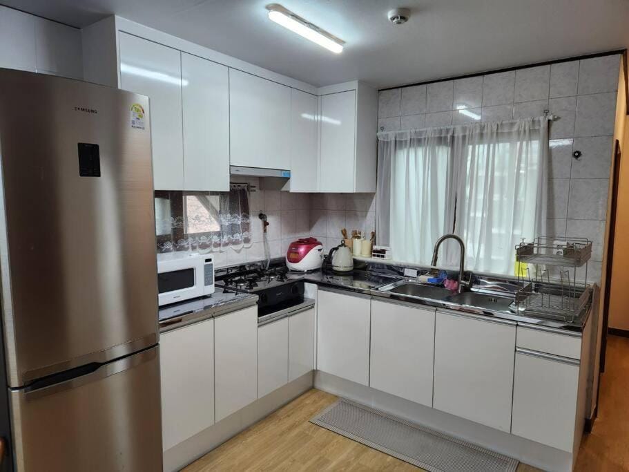 Kitchen or kitchenette, stove, toaster