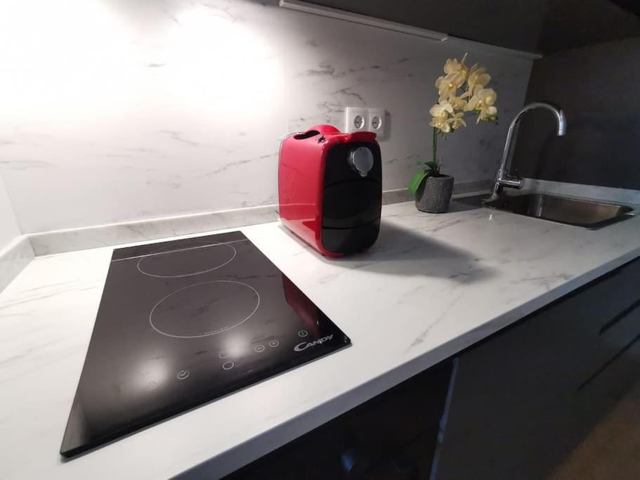 Kitchen or kitchenette, stove