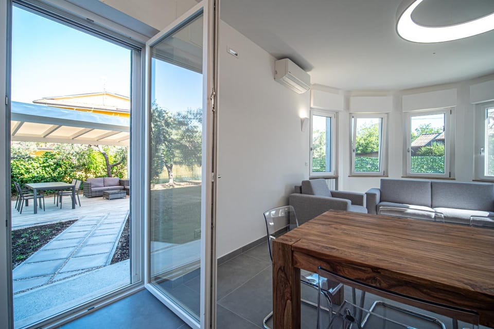 Living room, Dining area, Garden view, air conditioner