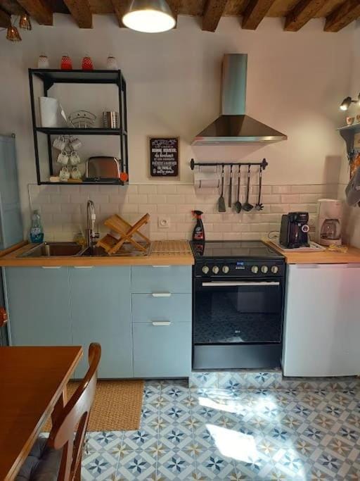 Kitchen or kitchenette, stove, toaster