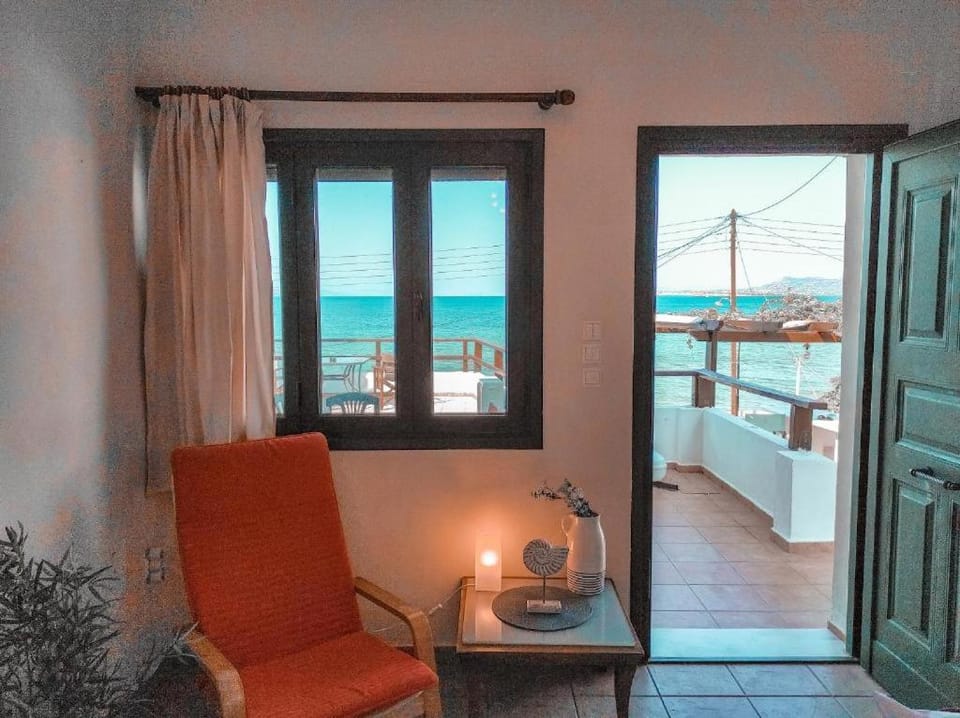 View (from property/room), Living room, Seating area, Sea view