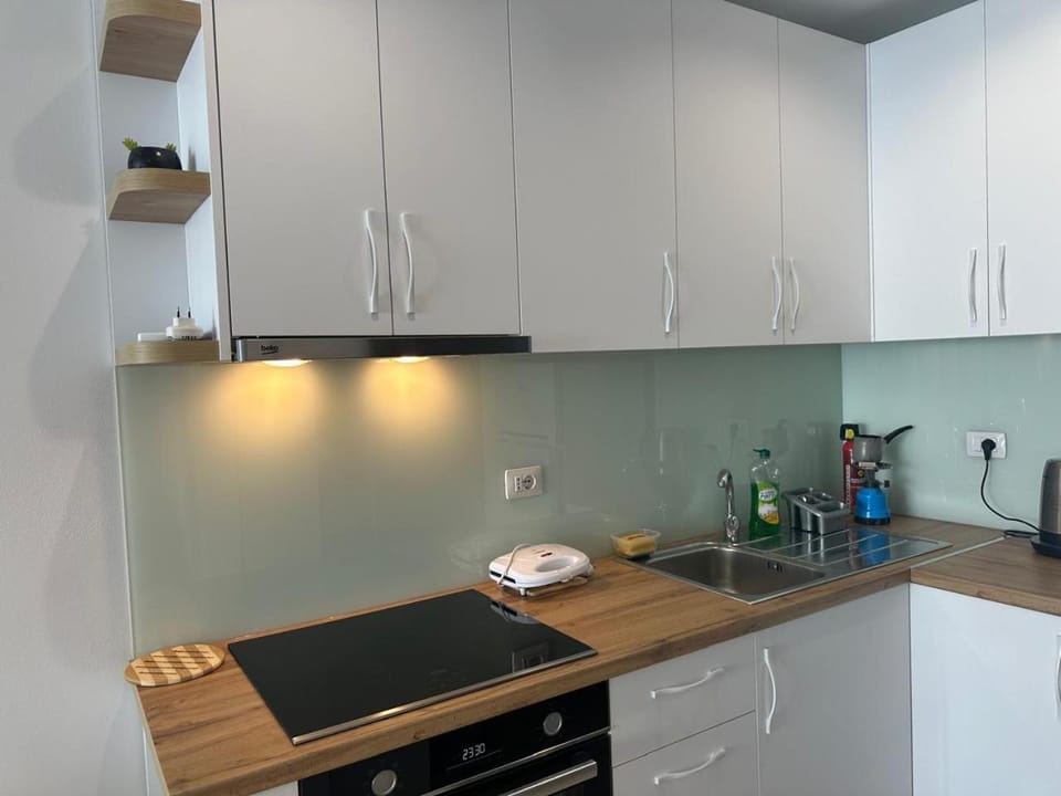 Kitchen or kitchenette, stove