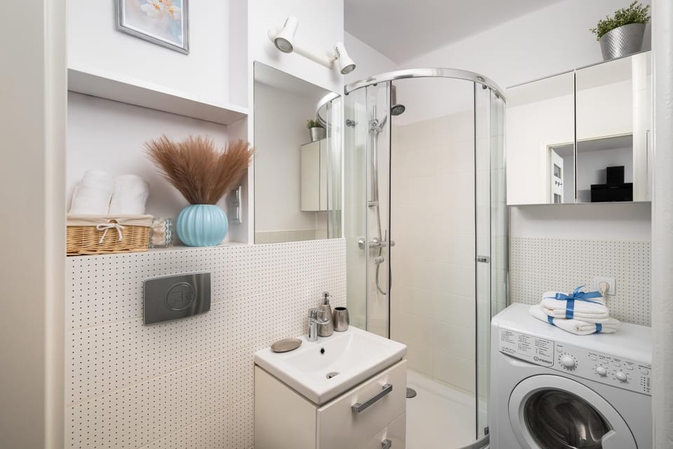 Shower, Bathroom, towels, washing machine, dryer