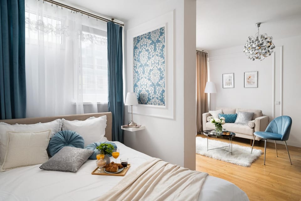 Bed, Living room, Seating area, Bedroom