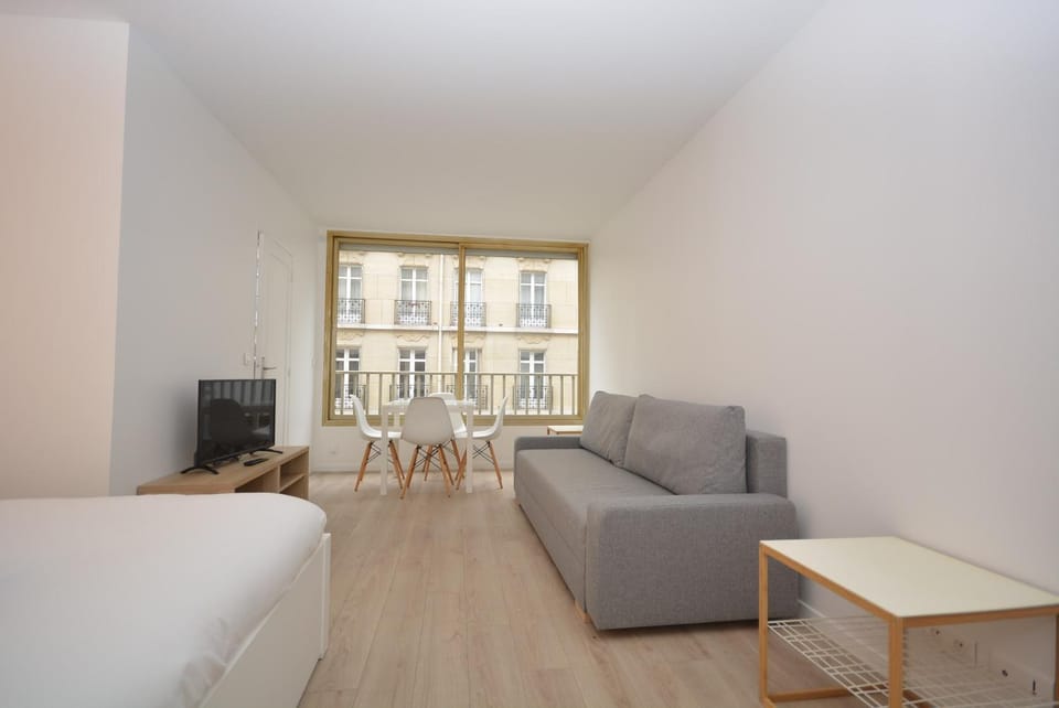 Bed, Living room, Seating area, Bedroom