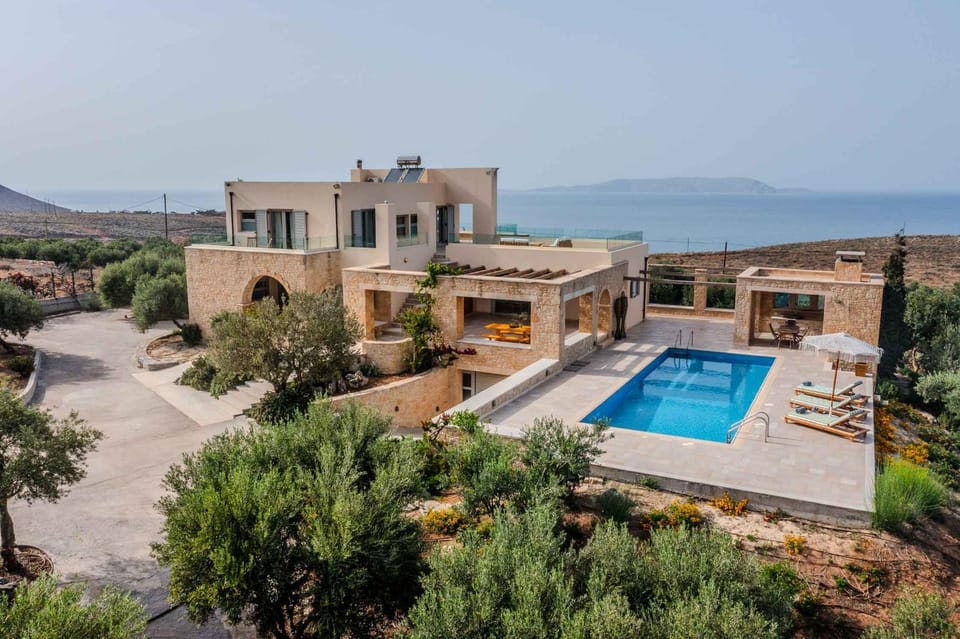 Property building, Natural landscape, Pool view, Sea view