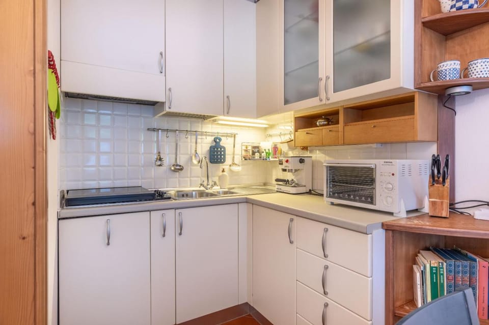 Kitchen or kitchenette, oven, stove