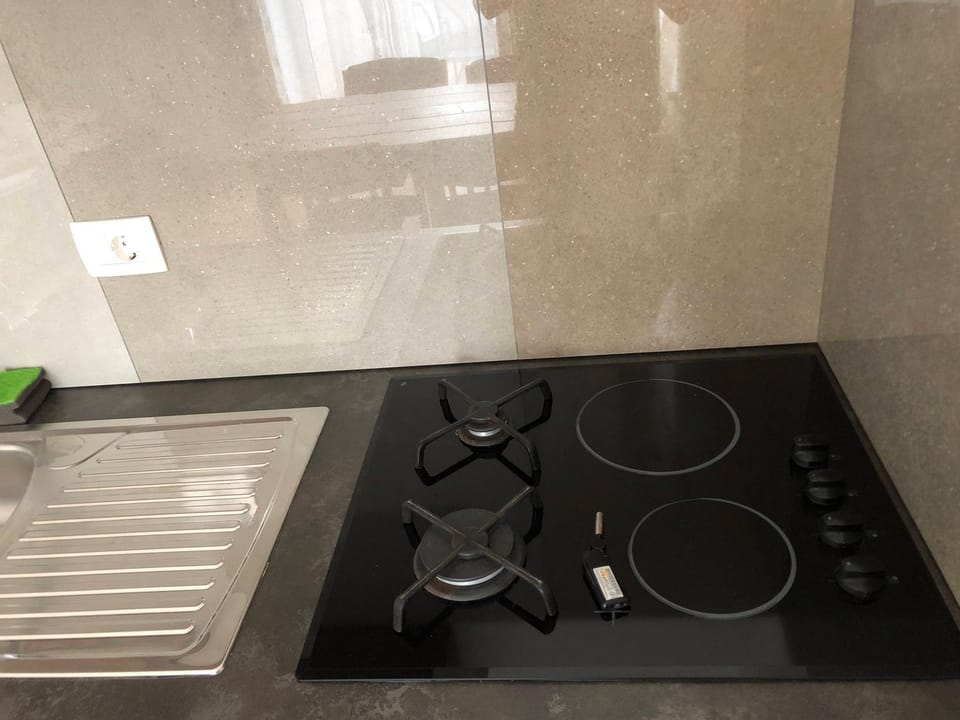 Kitchen or kitchenette, stove