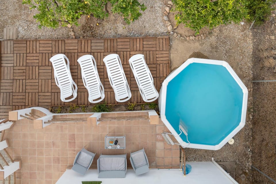 Property building, Living room, Swimming pool