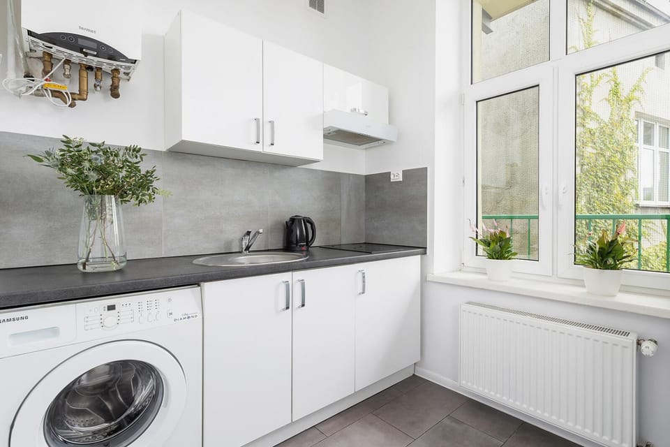 Kitchen or kitchenette, stove, washing machine