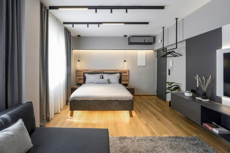 Bed, TV and multimedia, Seating area, Bedroom, air conditioner