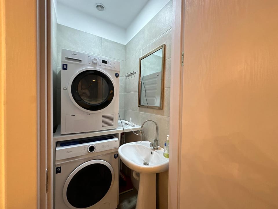 Bathroom, washing machine, dryer