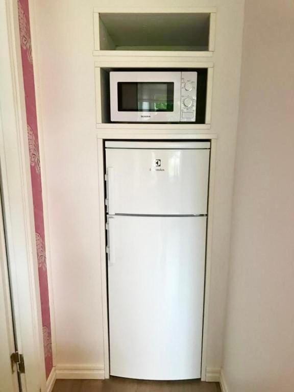 Kitchen or kitchenette, microwave