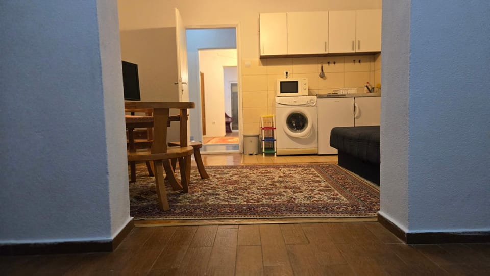 Kitchen or kitchenette, Living room, Seating area, Dining area, stove, washing machine, dryer