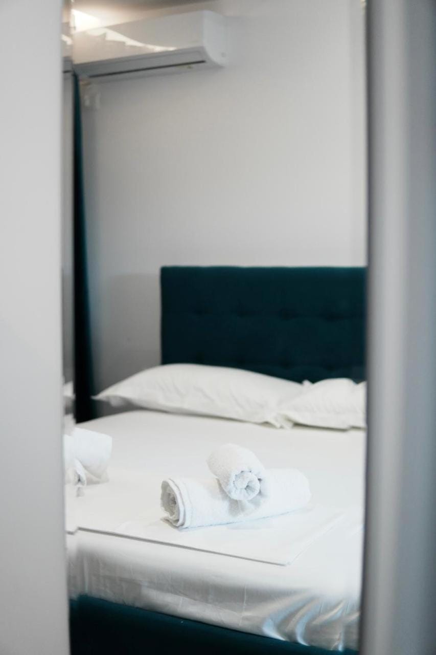 Bed, Photo of the whole room, Bedroom, towels, air conditioner