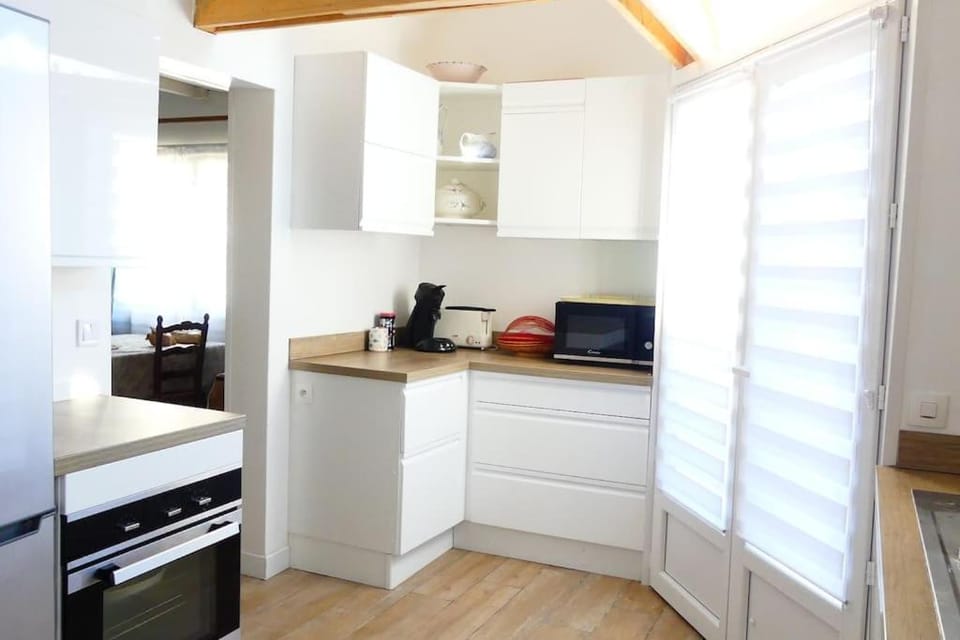 Kitchen or kitchenette, oven, stove, toaster