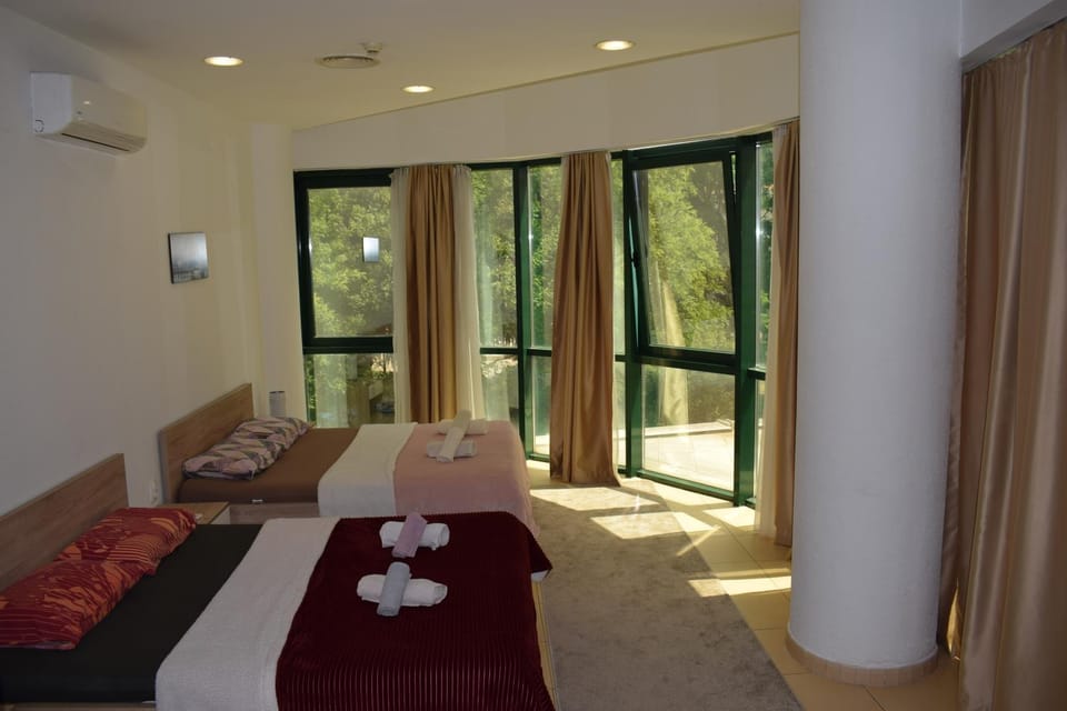 Bed, Photo of the whole room, Bedroom, towels, air conditioner