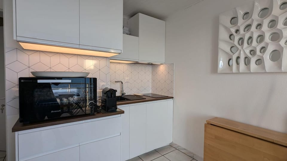 Kitchen or kitchenette, stove