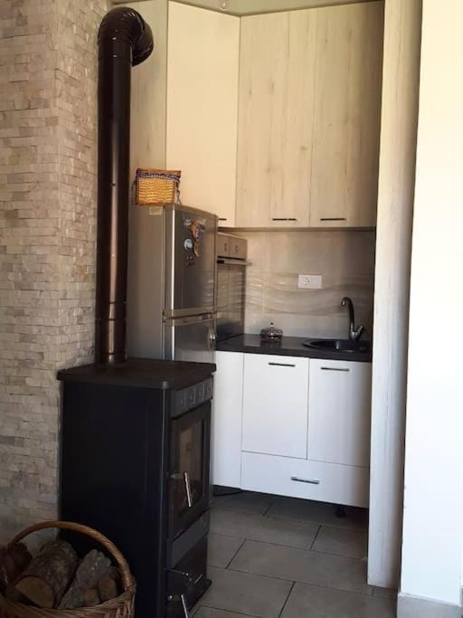 Kitchen or kitchenette, oven, stove