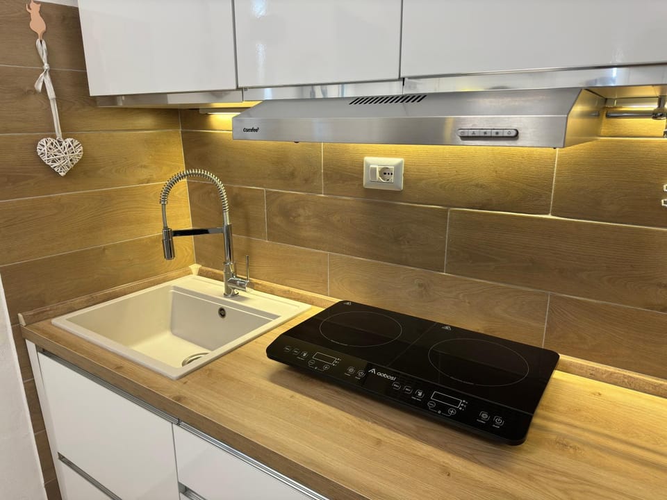 Kitchen or kitchenette, stove