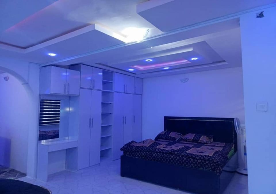 Bed, wardrobe