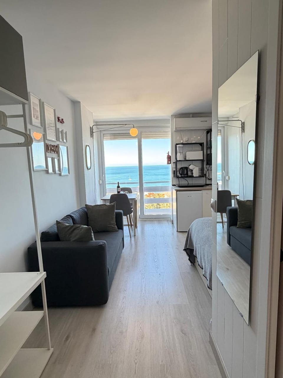 Kitchen or kitchenette, Living room, Seating area, Dining area, Sea view