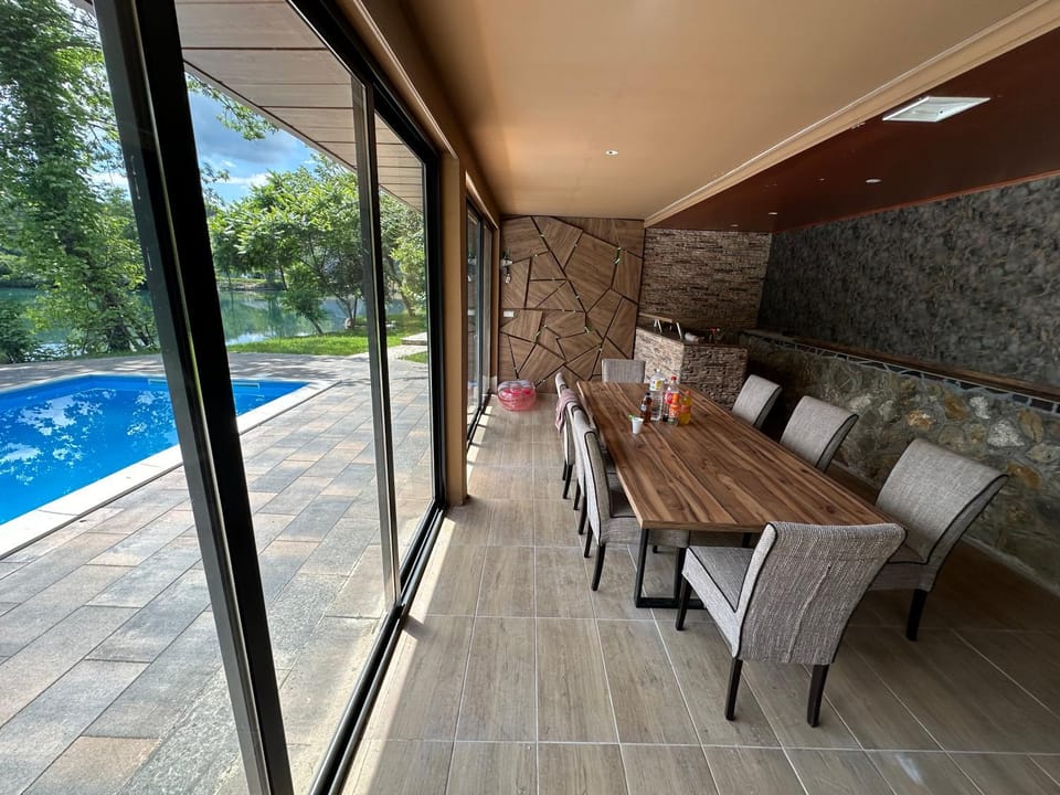 View (from property/room), Seating area, Dining area, Pool view, Swimming pool