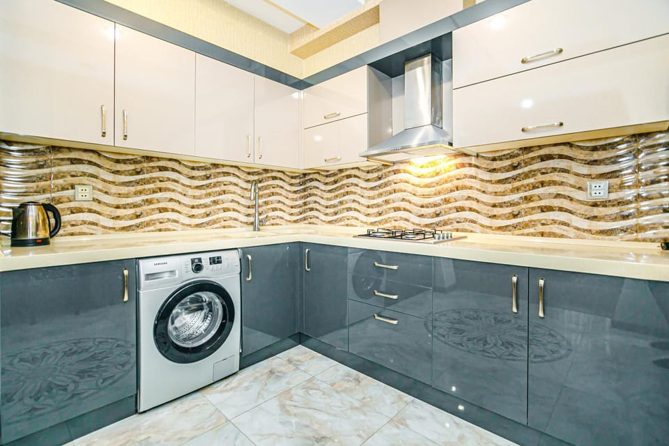Kitchen or kitchenette, washing machine