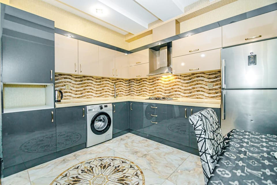 Kitchen or kitchenette, washing machine