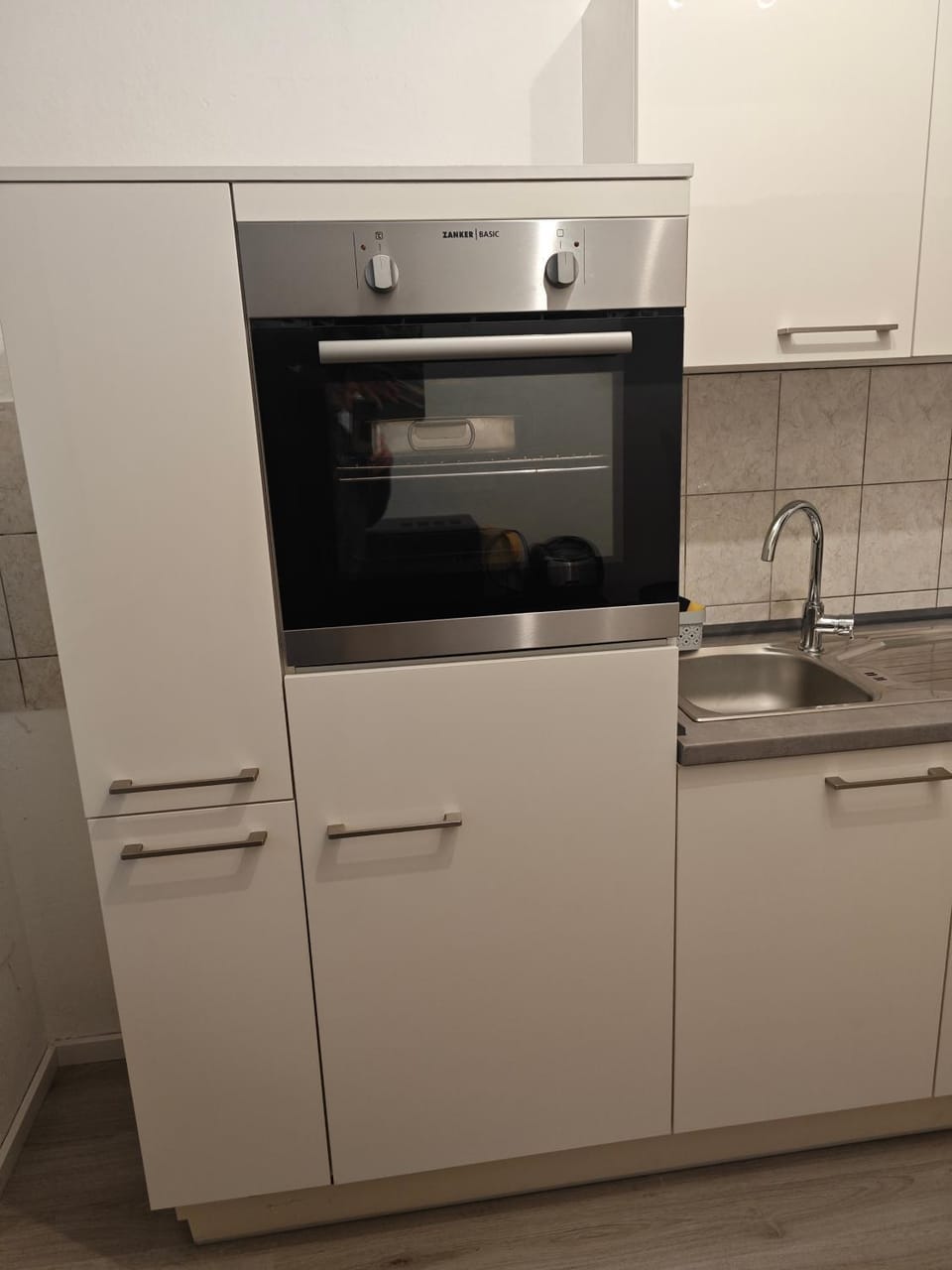Kitchen or kitchenette, oven, stove