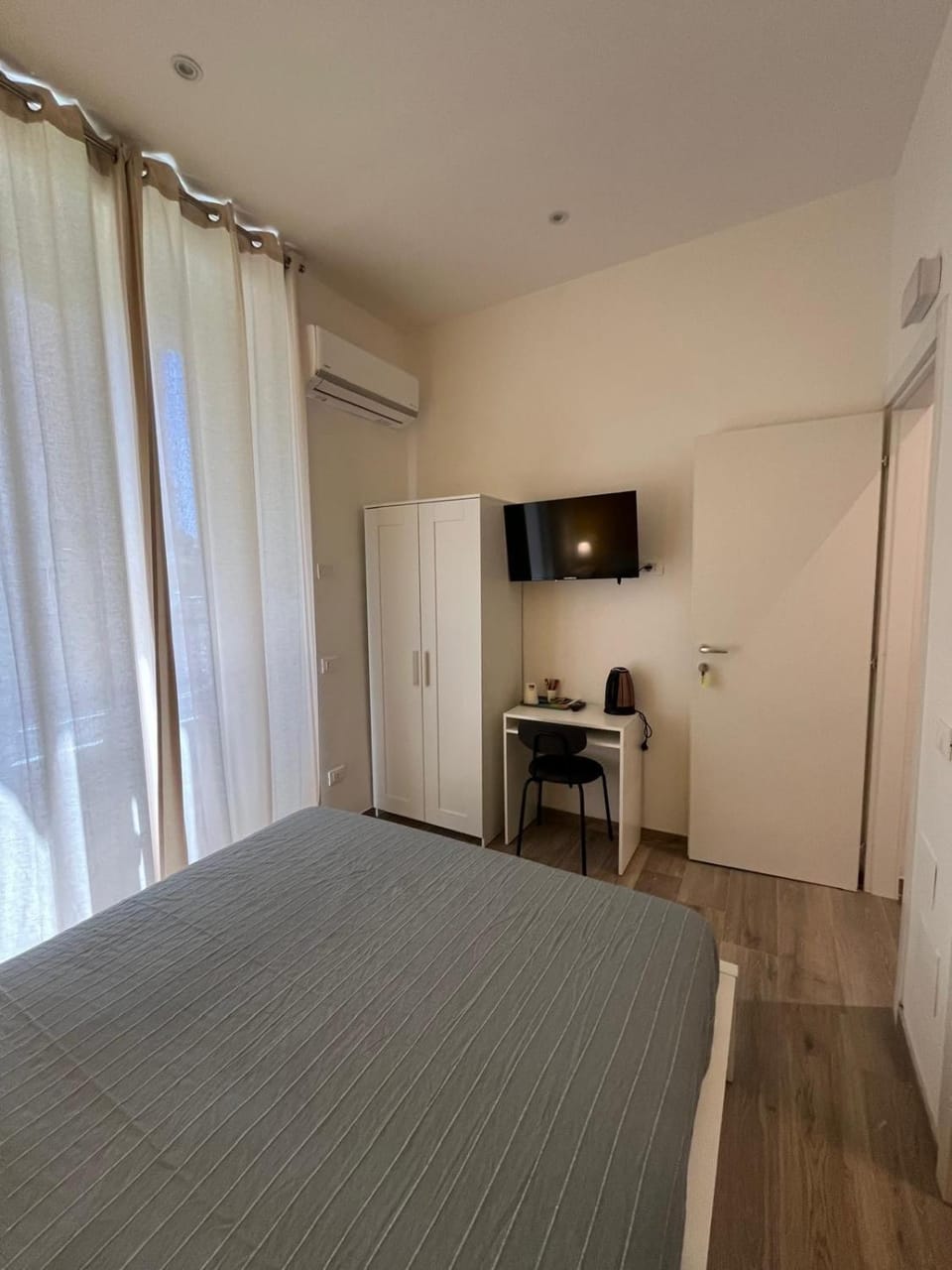 Bed, wardrobe, air conditioner