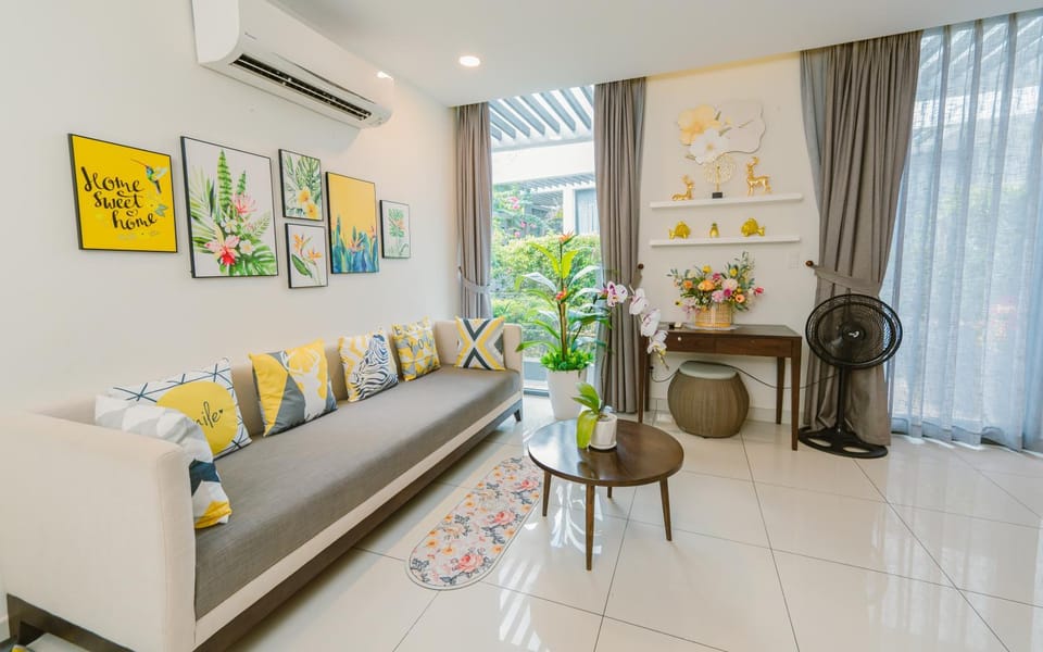 Living room, Seating area, group of guests, fireplace, air conditioner