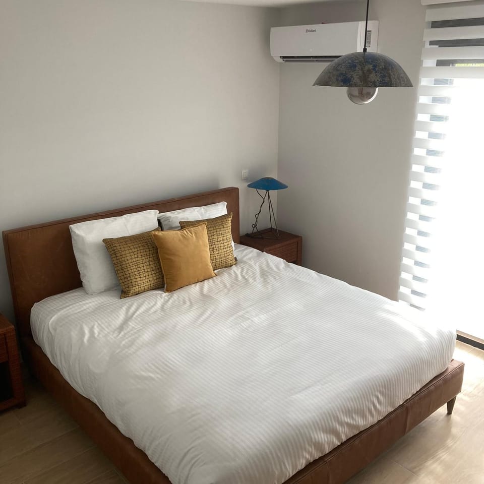 Bed, air conditioner