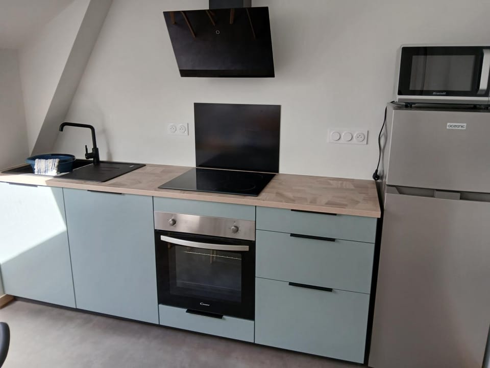 Kitchen or kitchenette, stove