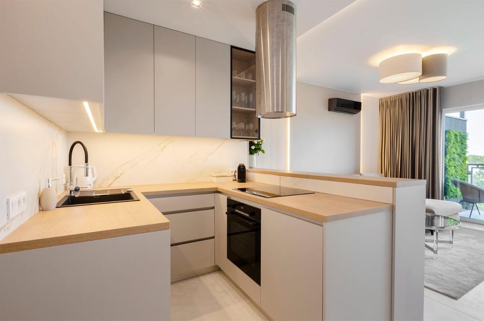 Kitchen or kitchenette, dishwasher, oven, stove