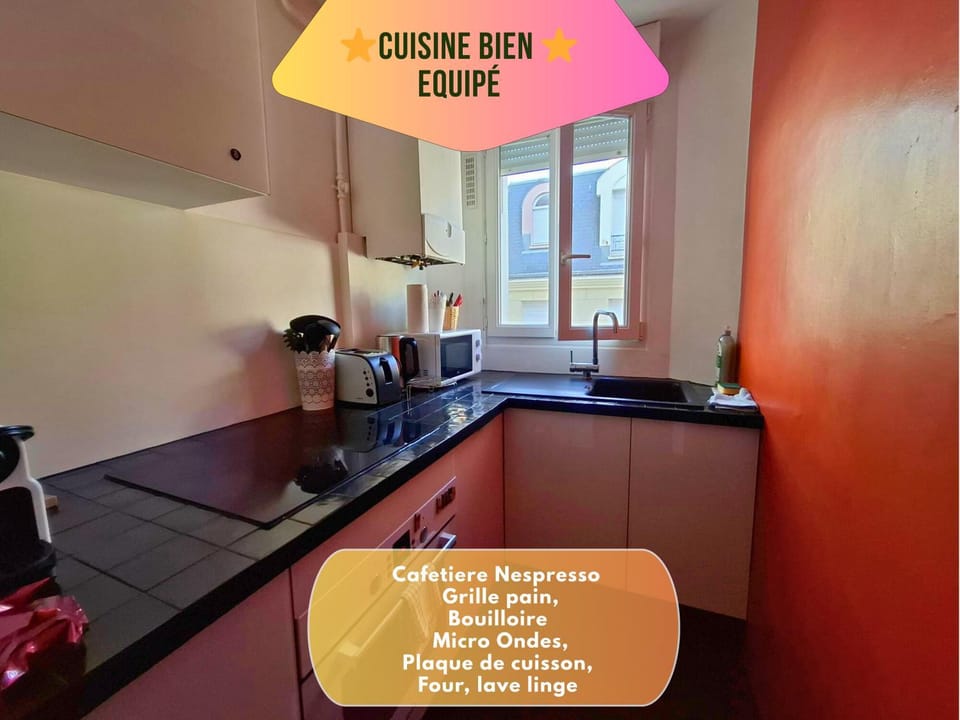 Kitchen or kitchenette, microwave, oven, stove, toaster, washing machine