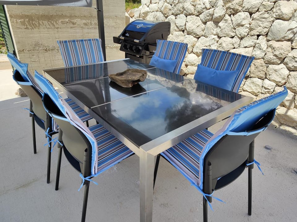 Property building, Day, BBQ facilities, Seating area