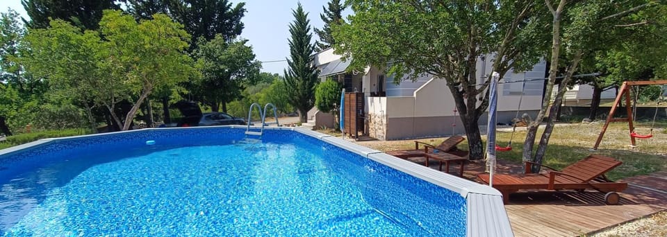 Property building, Garden, Pool view, Swimming pool