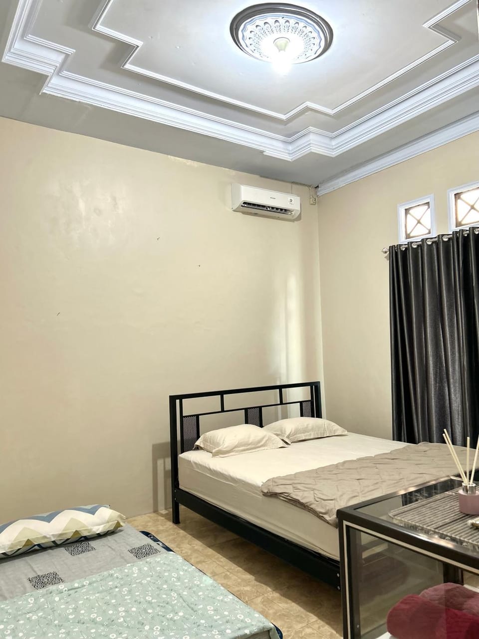 Toilet, Bed, Bedroom, hair dryier, towels, wardrobe, air conditioner, air conditioner