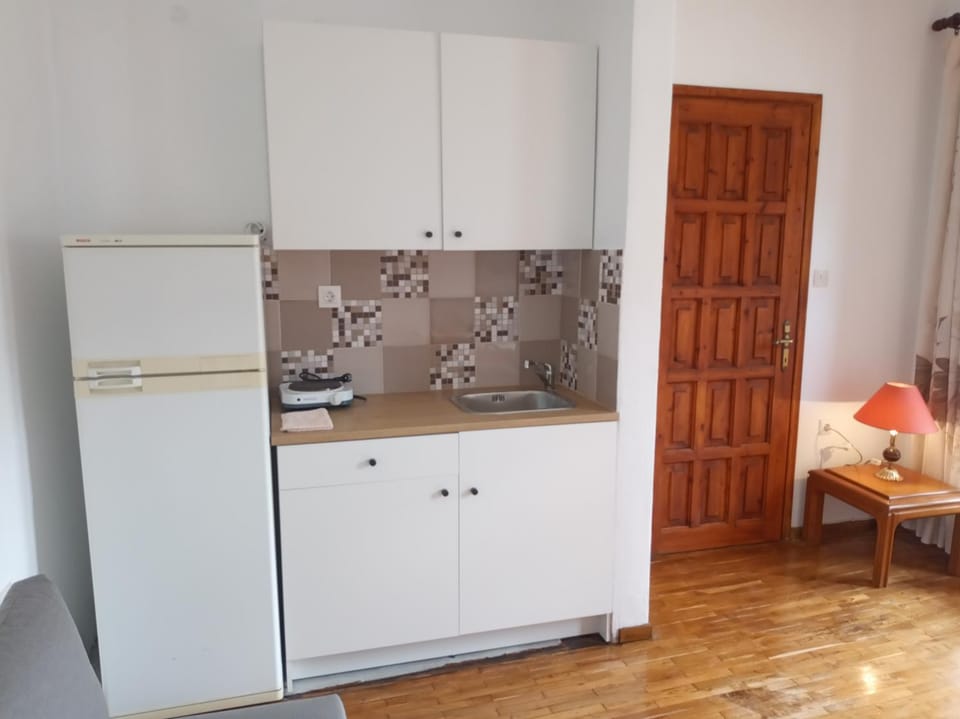 Kitchen or kitchenette, stove