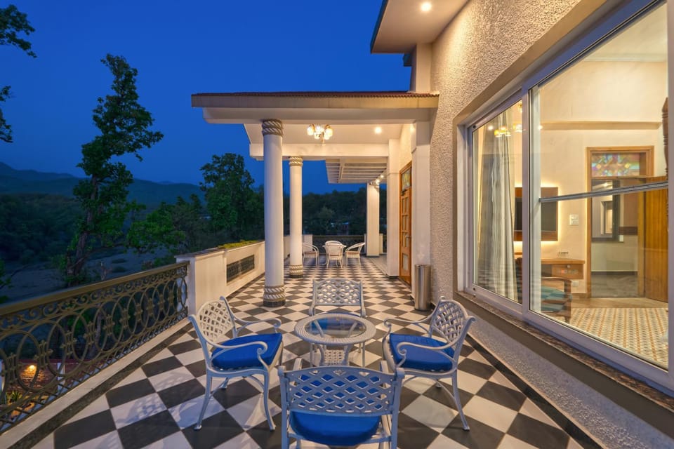 Property building, Patio, Night, Natural landscape, View (from property/room), Balcony/Terrace, Balcony/Terrace, Living room, Seating area, Dining area, Mountain view