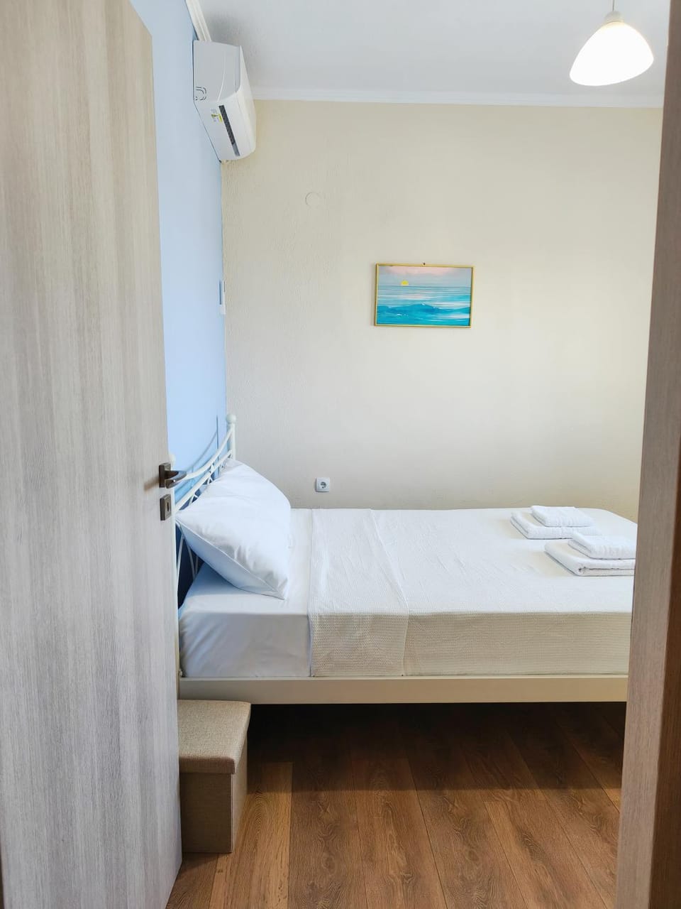 Bed, View (from property/room), Decorative detail, Sea view, towels, air conditioner